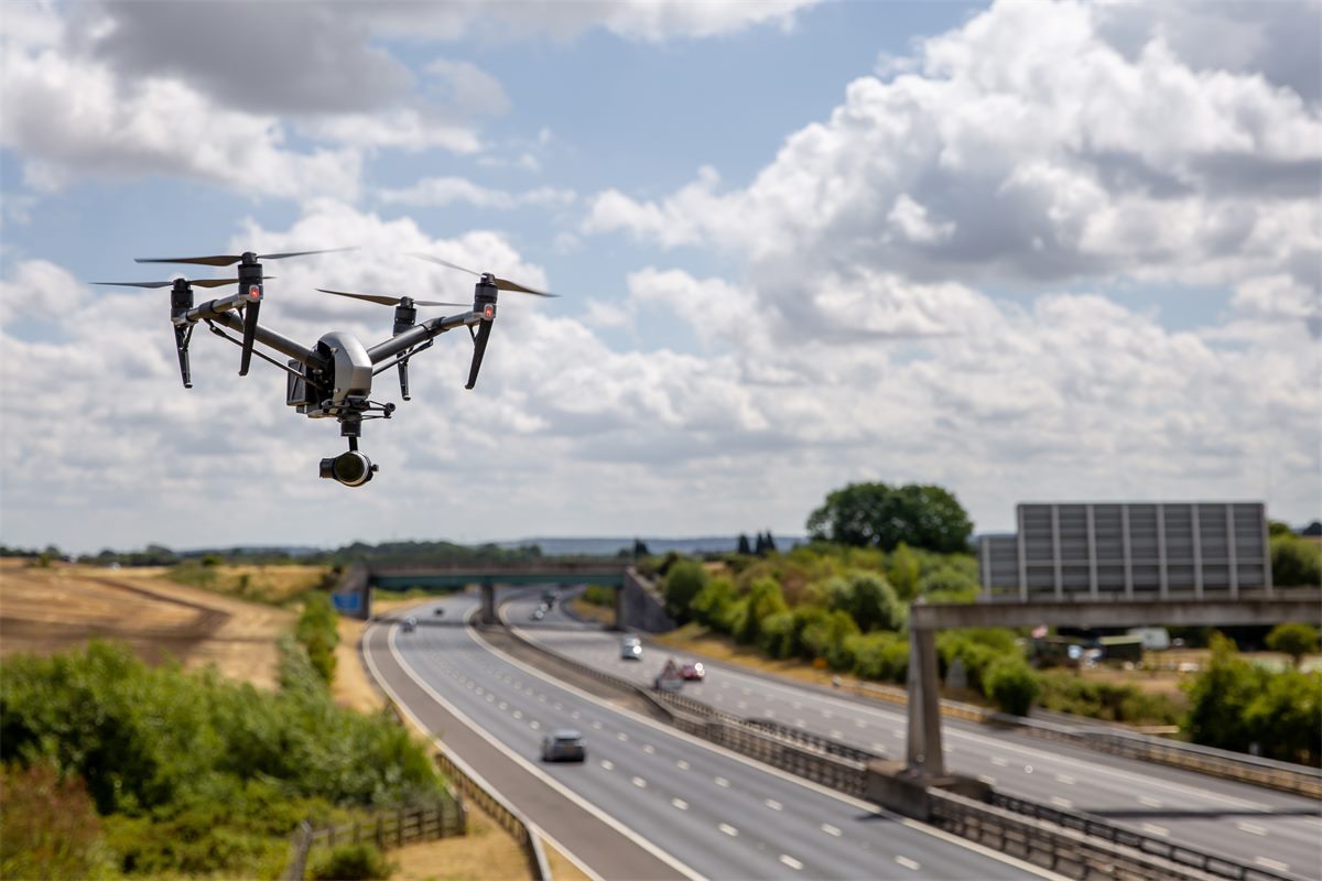 DJI Inspire drone flying over a live UK motorway