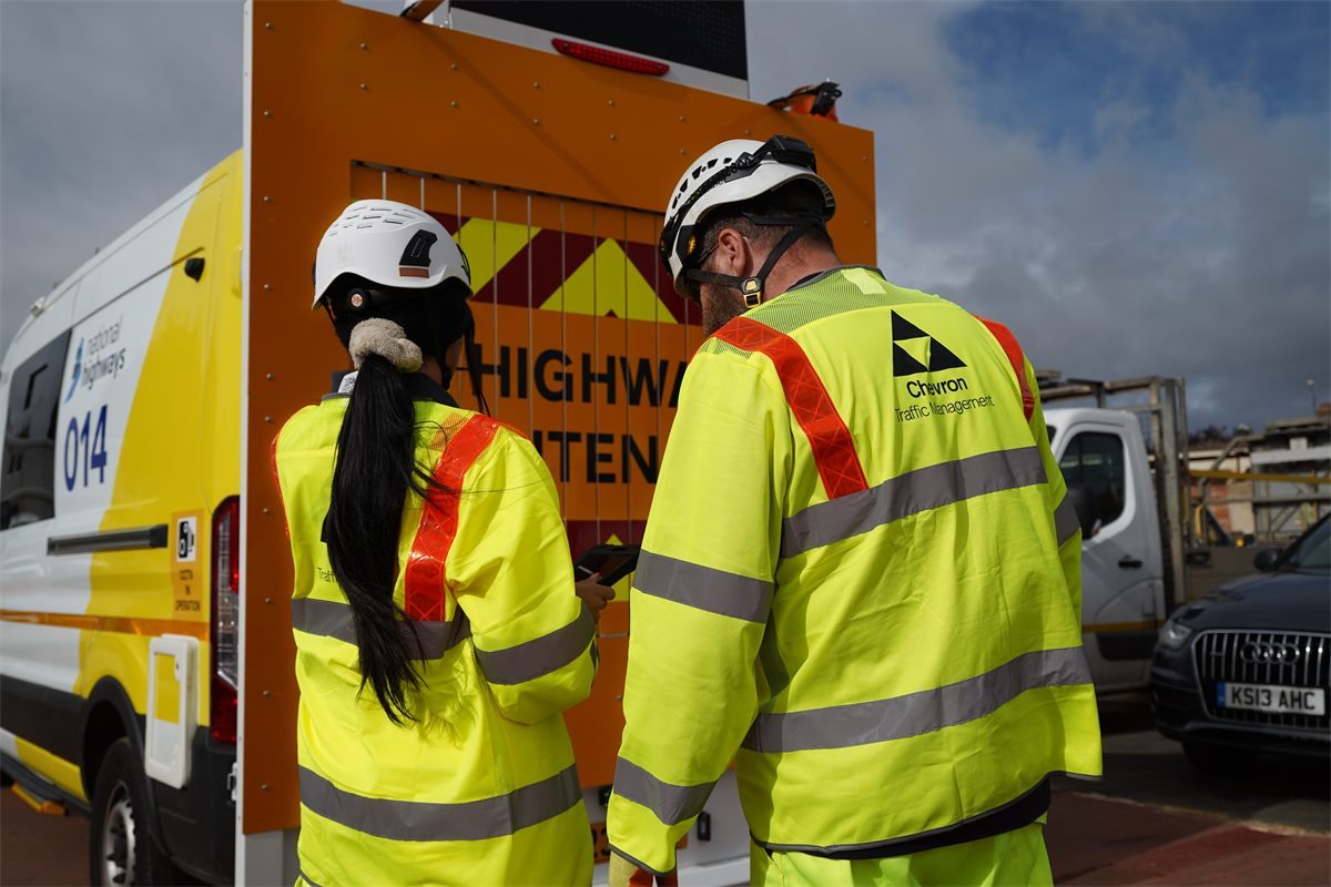 Chevron Traffic Management team reviewing a live-site briefing on a tablet